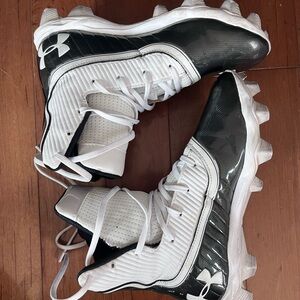 Under Armour high top football cleats. Youth size 5.